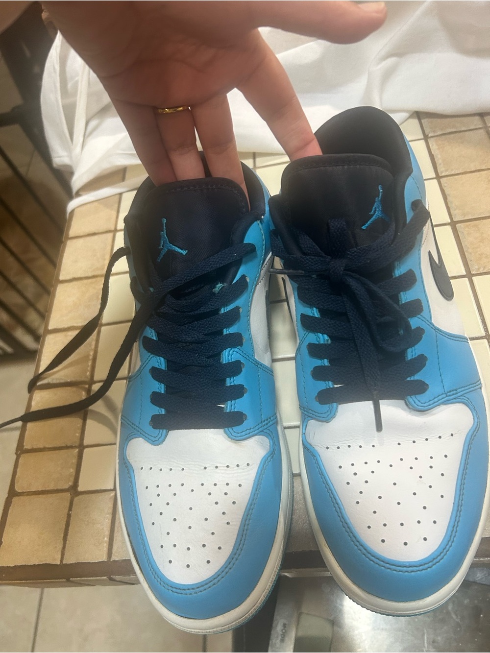 Jordan Low-Top Sneakers in University Blue, White, and Black